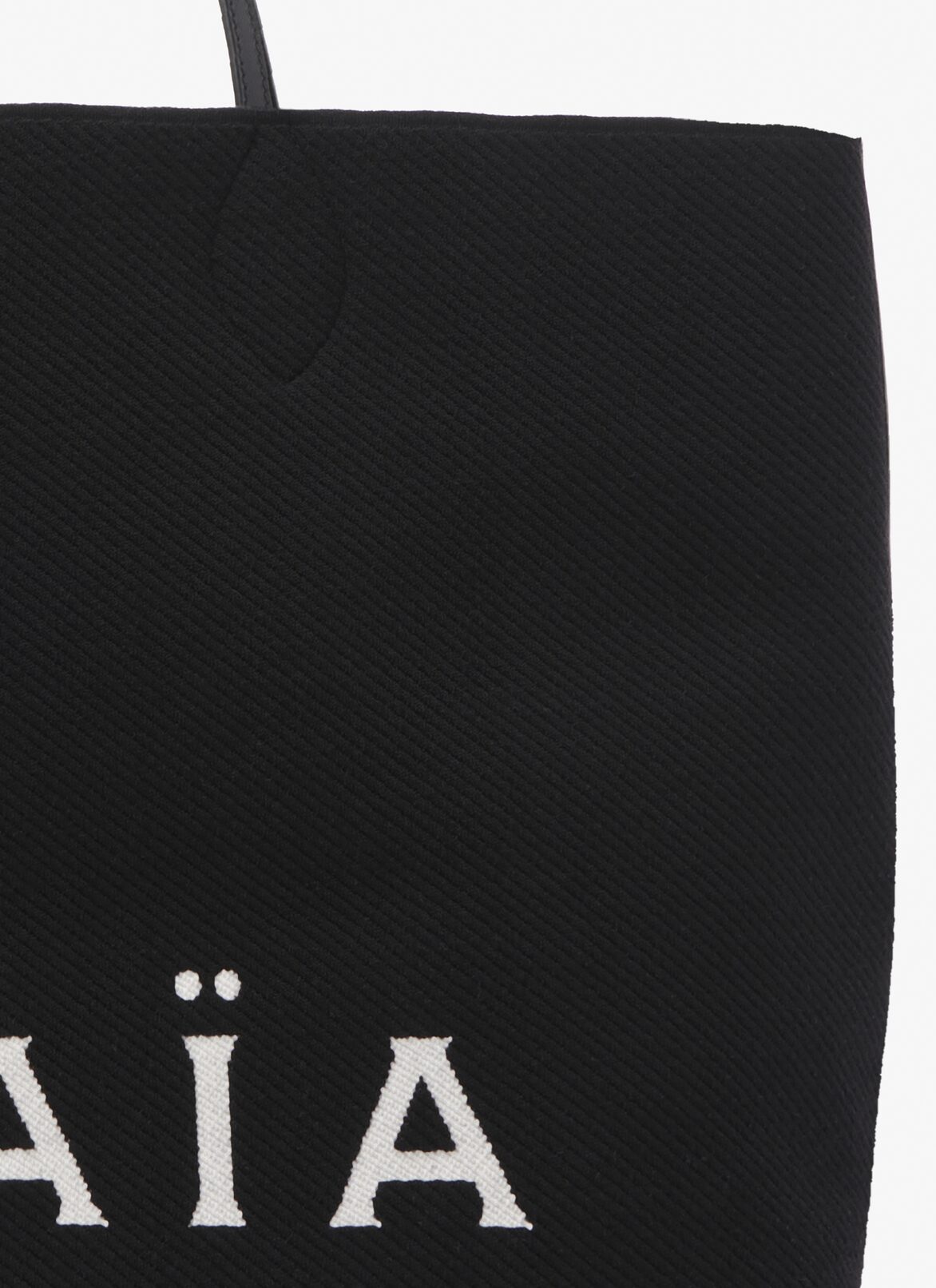 Large knit tote bag ALAÏA BLACK LARGE KNIT TOTE BAG